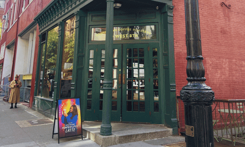 Greenwich Village Coffee Shops 22 Stumptown Coffee shop Greenwich Village exterior featuring green doors, large windows, a sidewalk latte sign, and a classic NYC street setting.