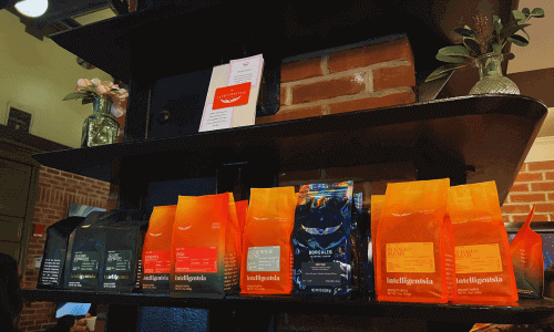 Intelligentsia Coffee Chelsea – Best Coffee NYC | FlorR 1 Display of whole roasted coffee beans at Intelligentsia Coffee Chelsea coffee roasters in Manhattan NYC