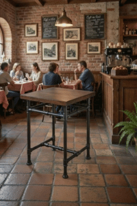 24 inch industrial rustic iron pipe table with wood top in coffee shop interior