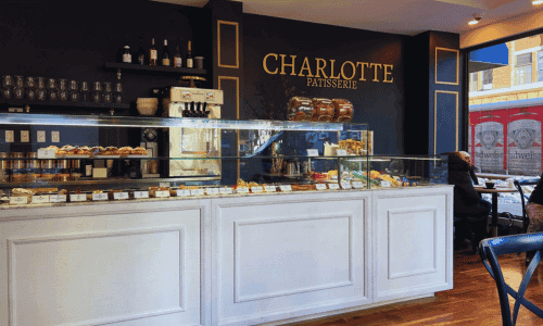 Charlotte Patisserie Chelsea – Best Bakery & Coffee NYC 2 interior of Charlotte Patisserie Chelsea near 14th Street New York City with pastry display and coffee bar