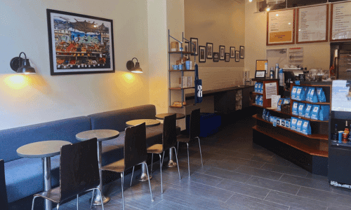 interior seating area of Joe Coffee Company Chelsea 23rd Street near the High Line NYC