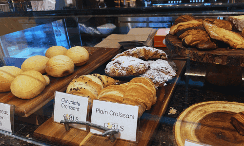 pastries and croissants display at Cafe by the Girls Chelsea near the High Line New York City