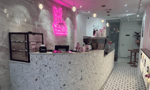 Kawaii Coffee West Village – Best Vietnamese Coffee NYC 2 Espresso bar at Kawaii Coffee West Village Vietnamese coffee shop in NYC with counter and neon sign